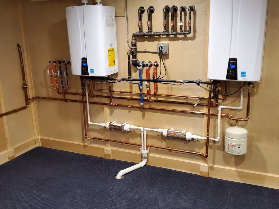 New residential water heater install with code-compliant connections